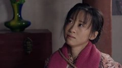 练束梅